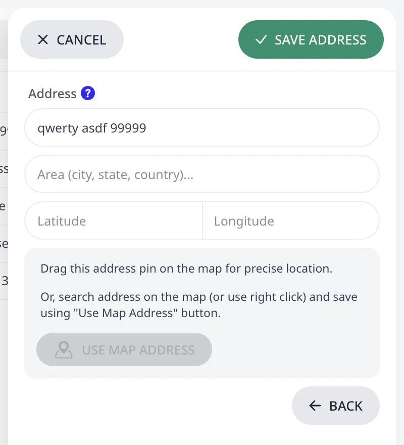 The address editor with manual latitude and longitude fields, the draggable-pin hint, and the Use Map Address button